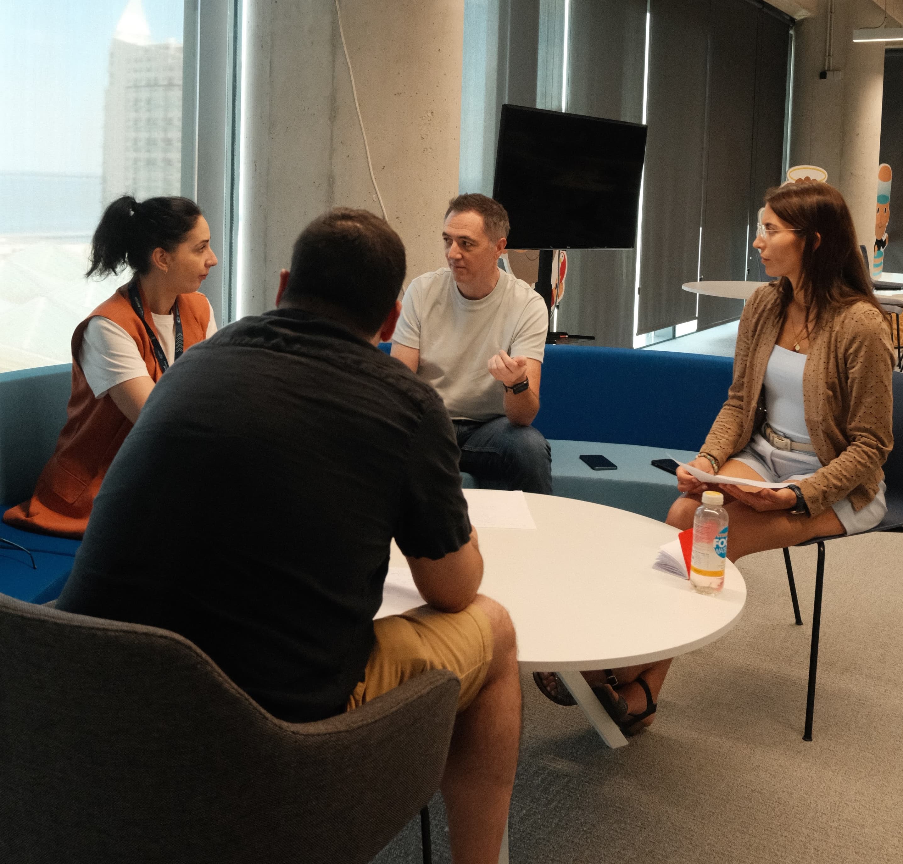 Small group conversation during a Product Circle session.